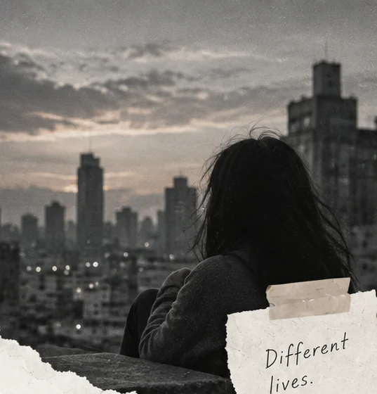 Young person overlooking a city